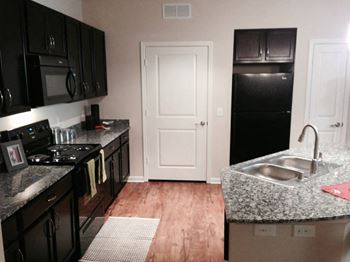 Updated kitchen with black appliances